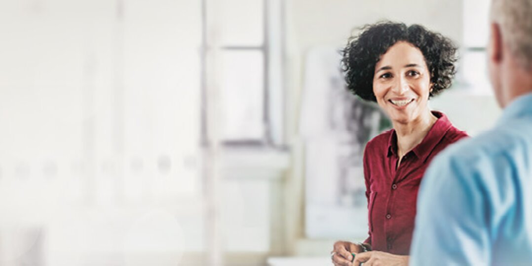 Woman talking with team 