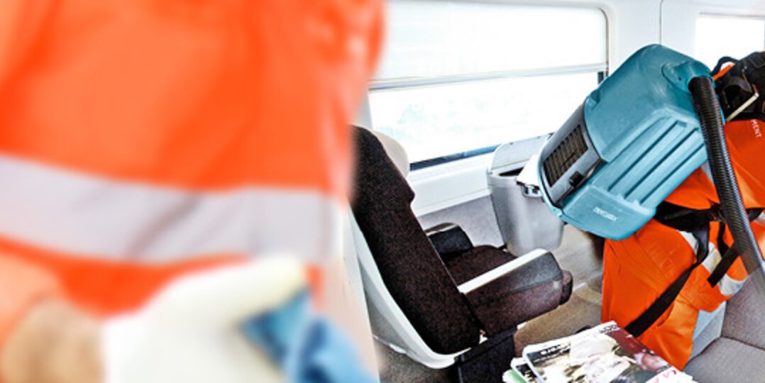 Cleaners clean train from the inside 